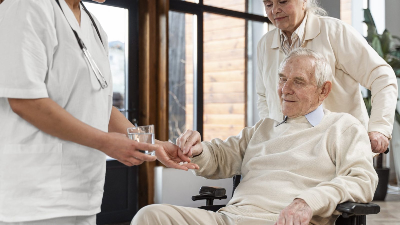 doctor-giving-pills-her-patient