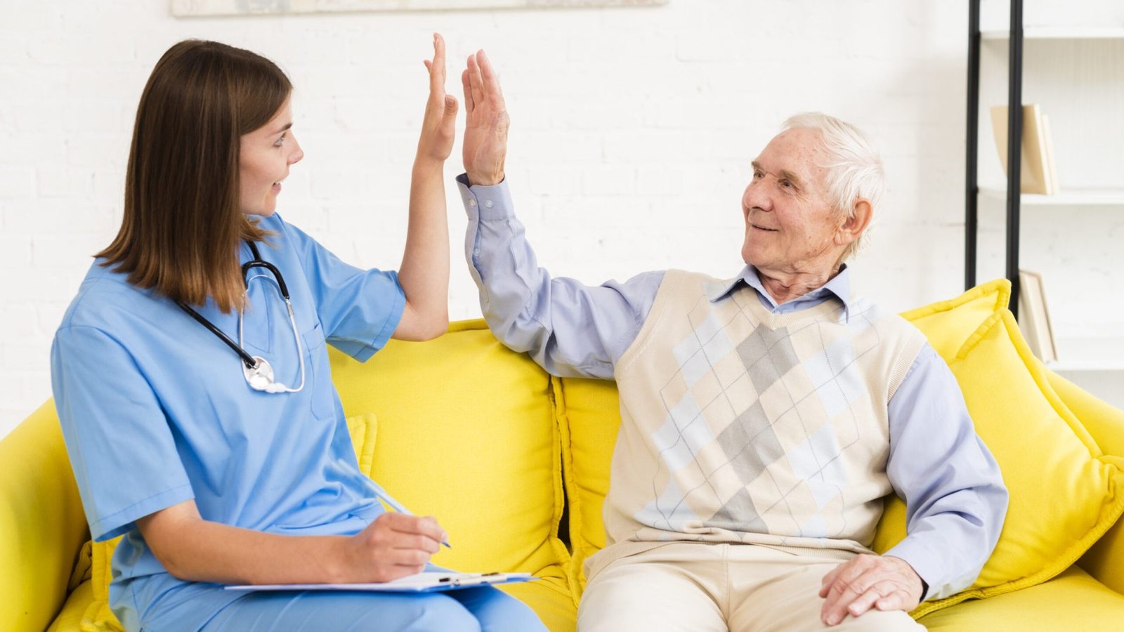 medium-shot-caregiver-high-fiving-with-old-man